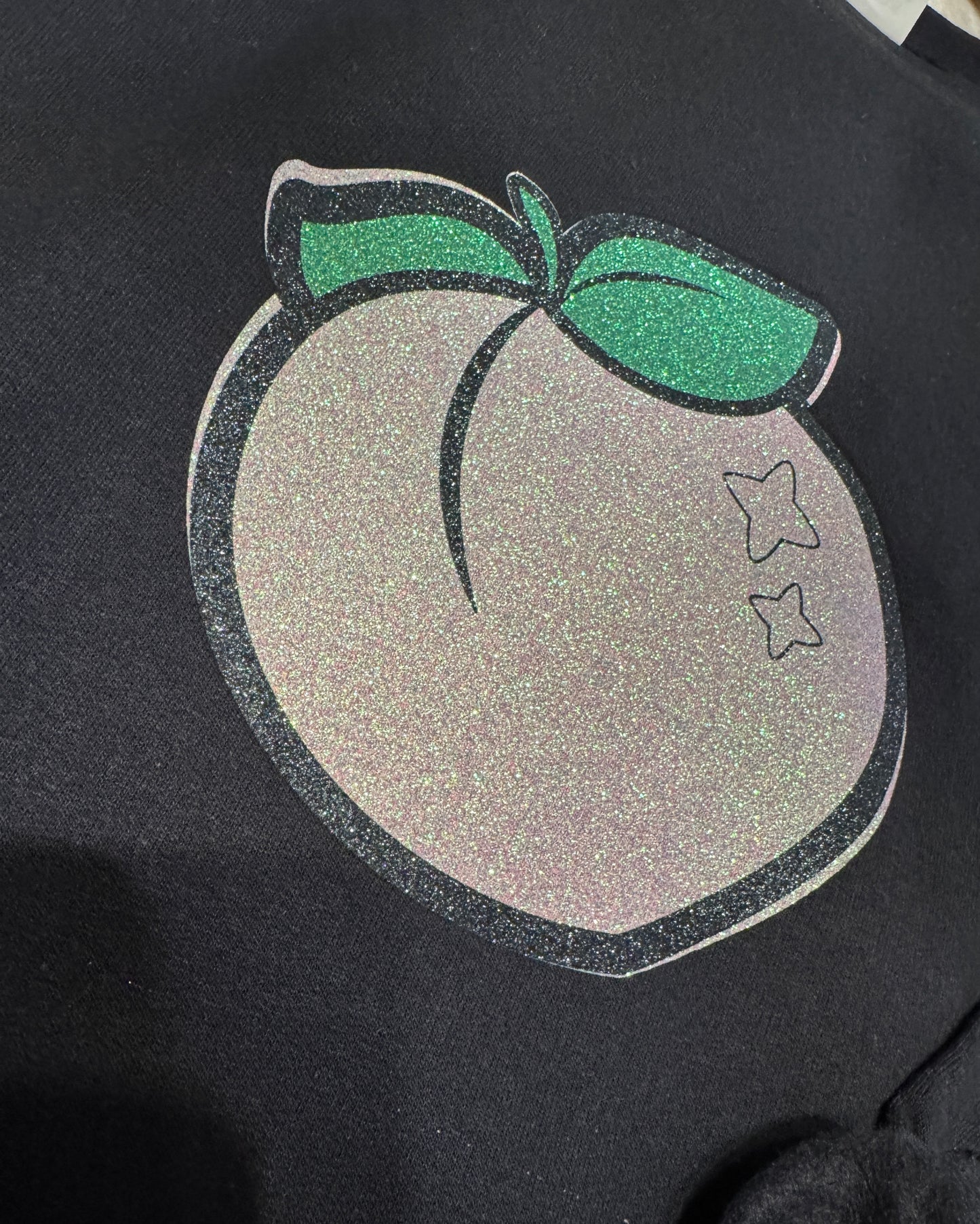Black Sweatshirt with Glittery Peach Graphic – Sweet, Bold & Chic Sparkle Style