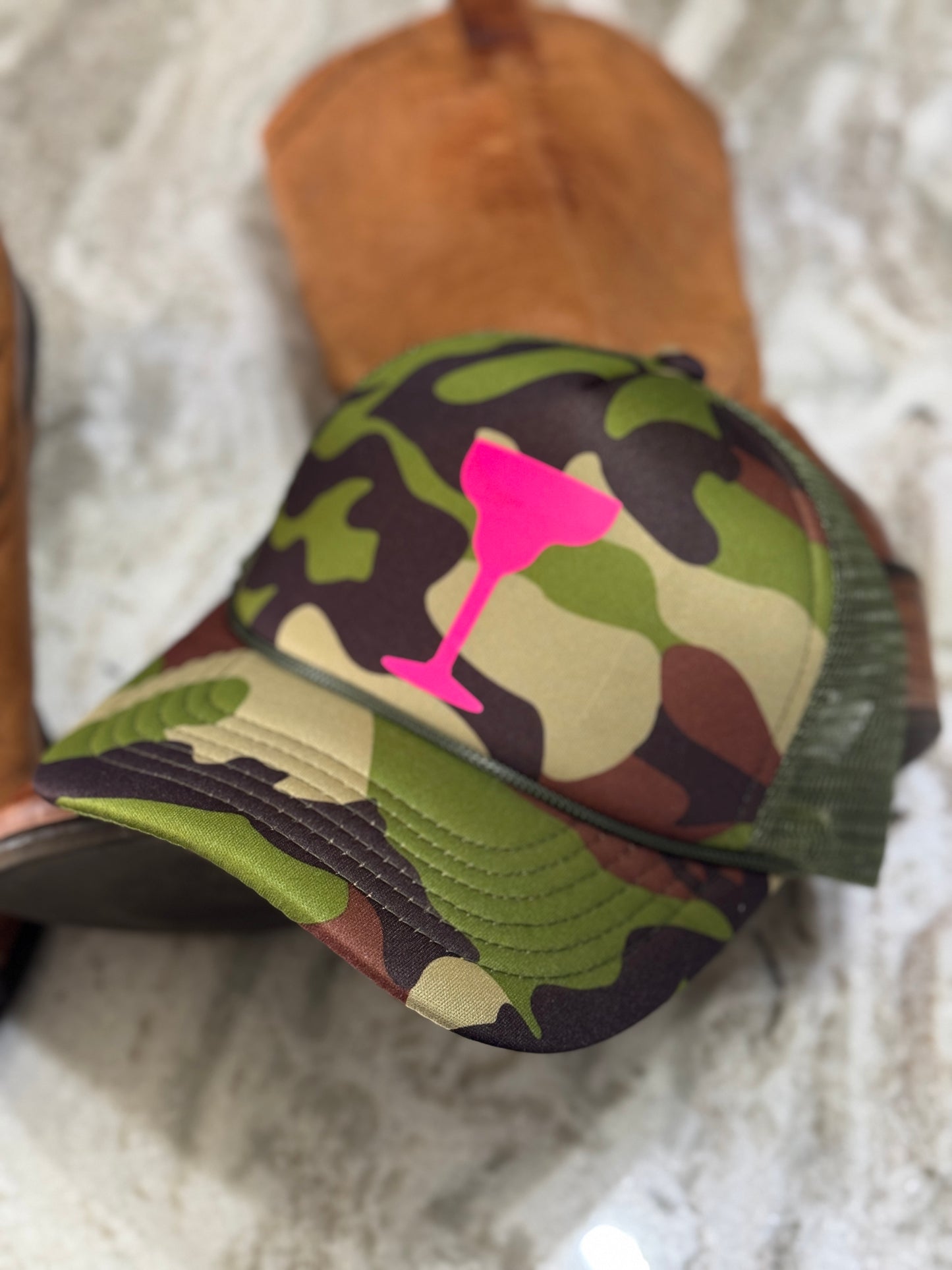 Camo Cocktail Trucker Hat โ Camouflage with Neon Pink Cocktail Glass Graphic