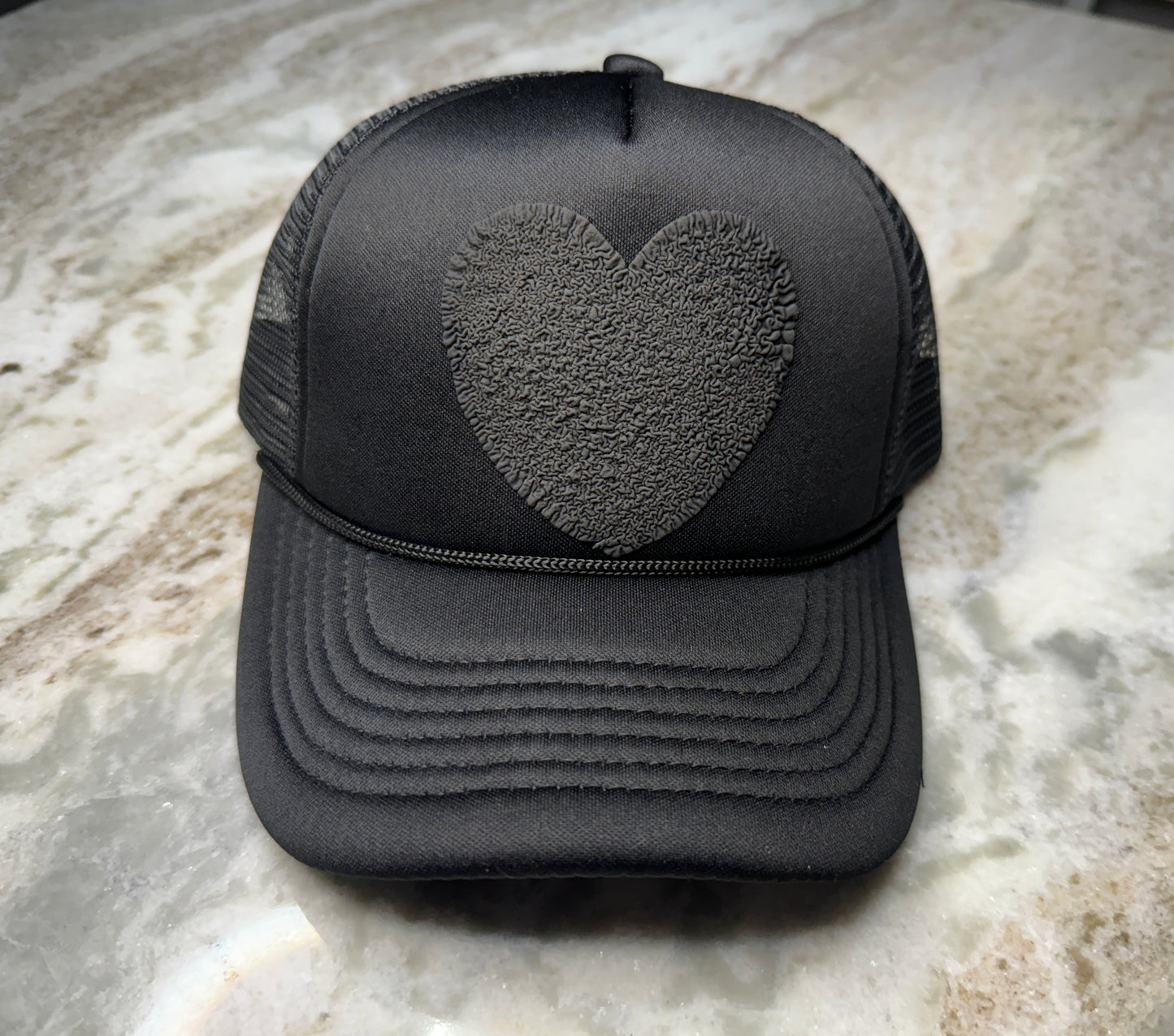Effortlessly Cool | Black Trucker Hat with Puffy Heart Graphic