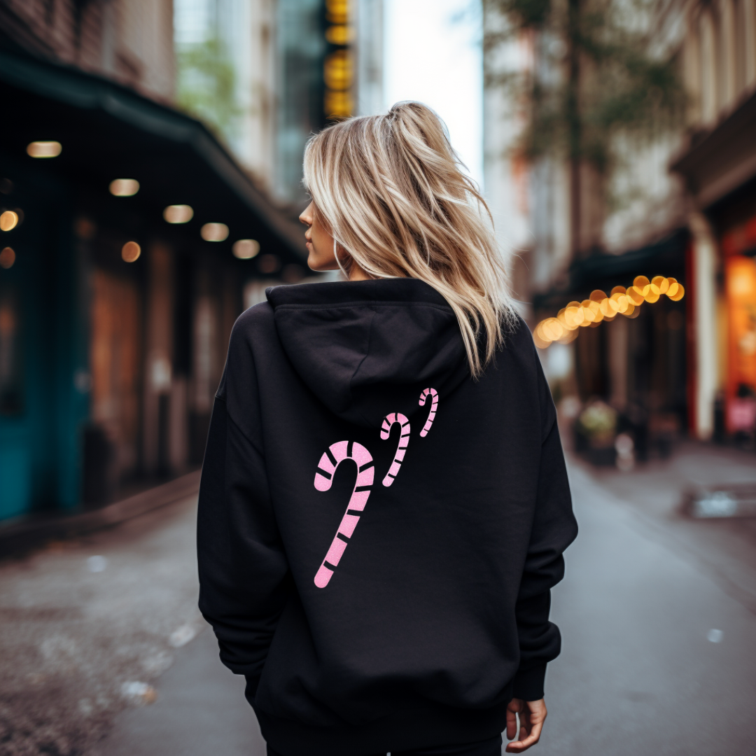 Festive & Cozy | Candy Cane Hoodie in White or Black with Glitter Designs on model