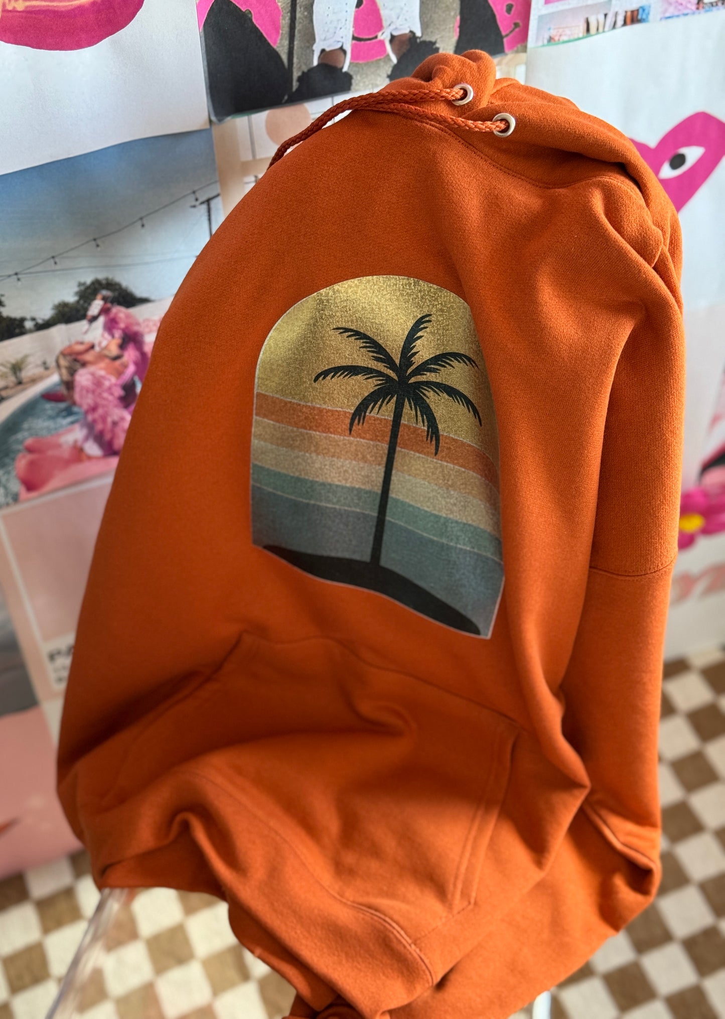 Golden Hour Hoodie – Burnt Orange with Holographic Sunset & Palm Tree Graphic