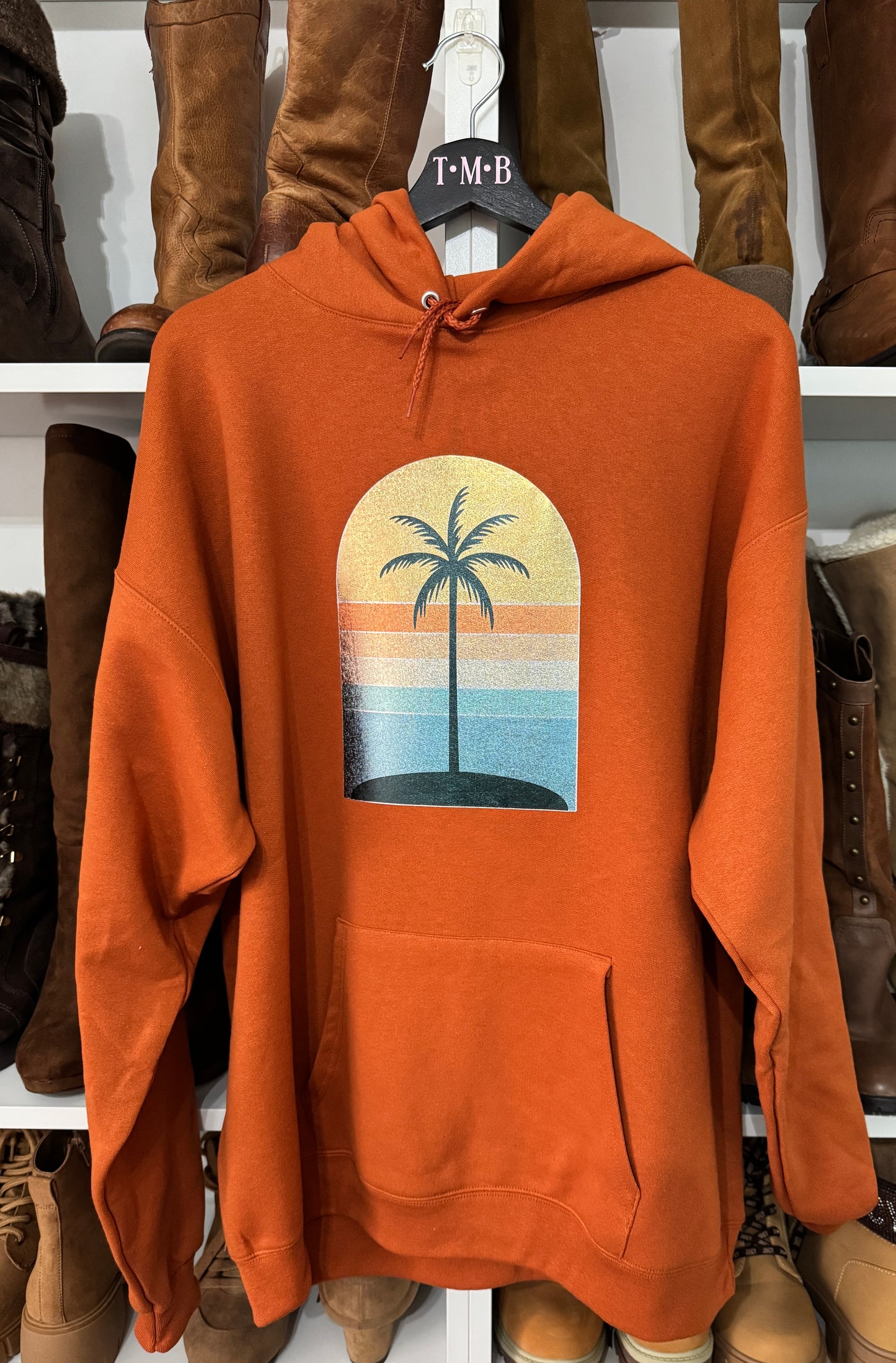 Golden Hour Hoodie – Burnt Orange with Holographic Sunset & Palm Tree Graphic