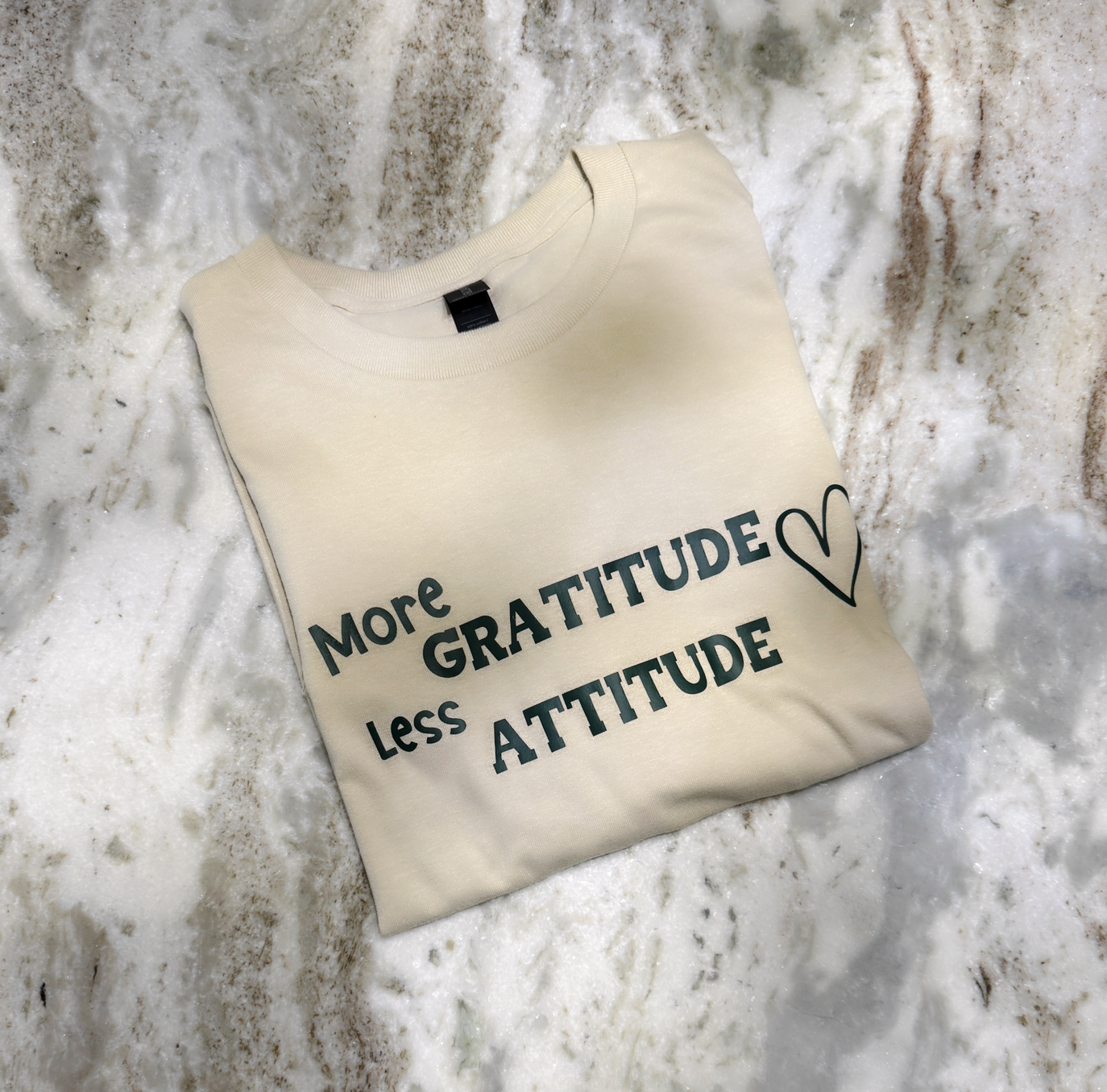Grateful & Stylish | Sand-Colored Tee with "More Gratitude Less Attitude" Graphic