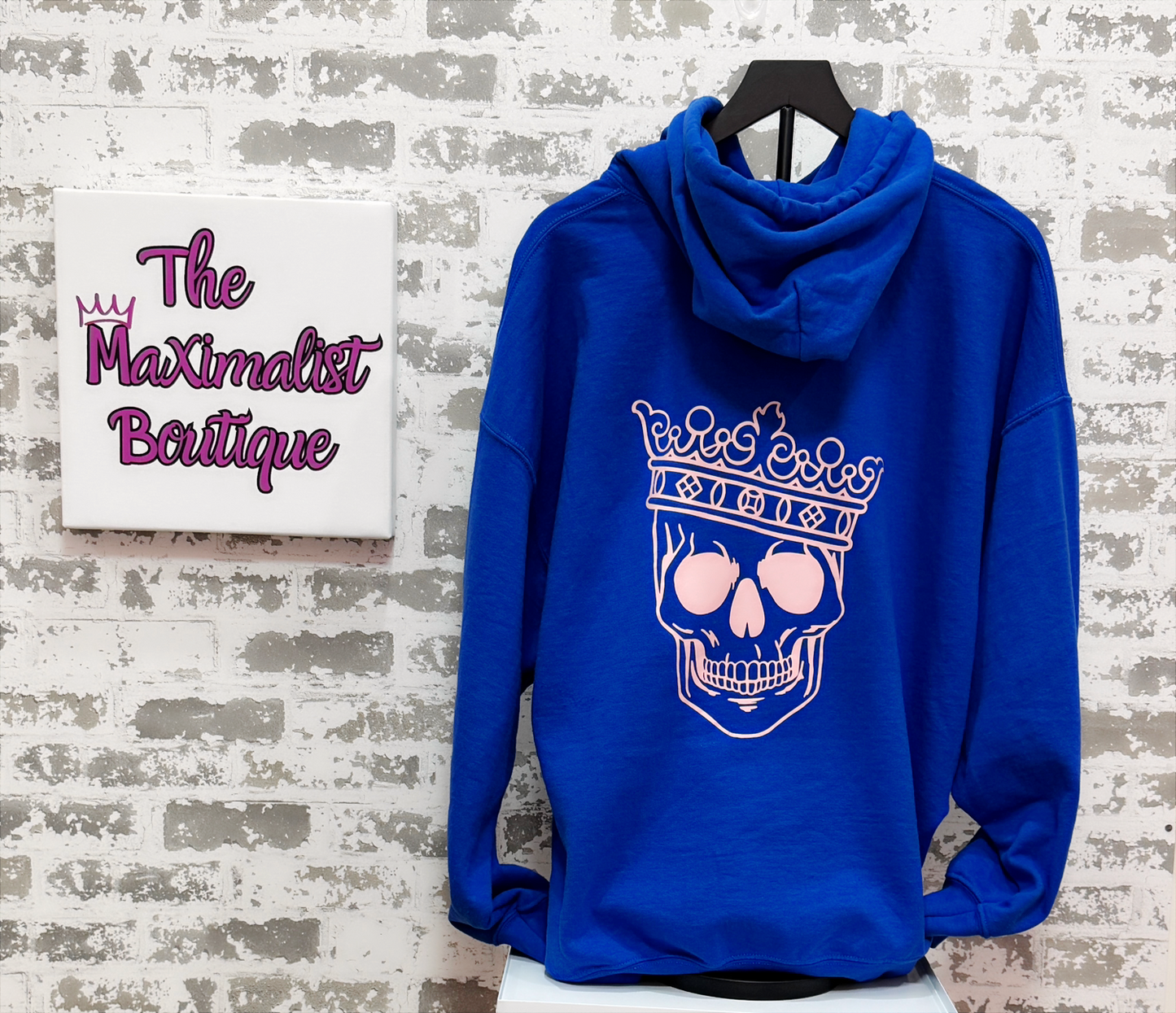 Reign Supreme Hoodie – Royal Blue Pullover with Pink Crowned Skull Graphic for Edgy Regal Style