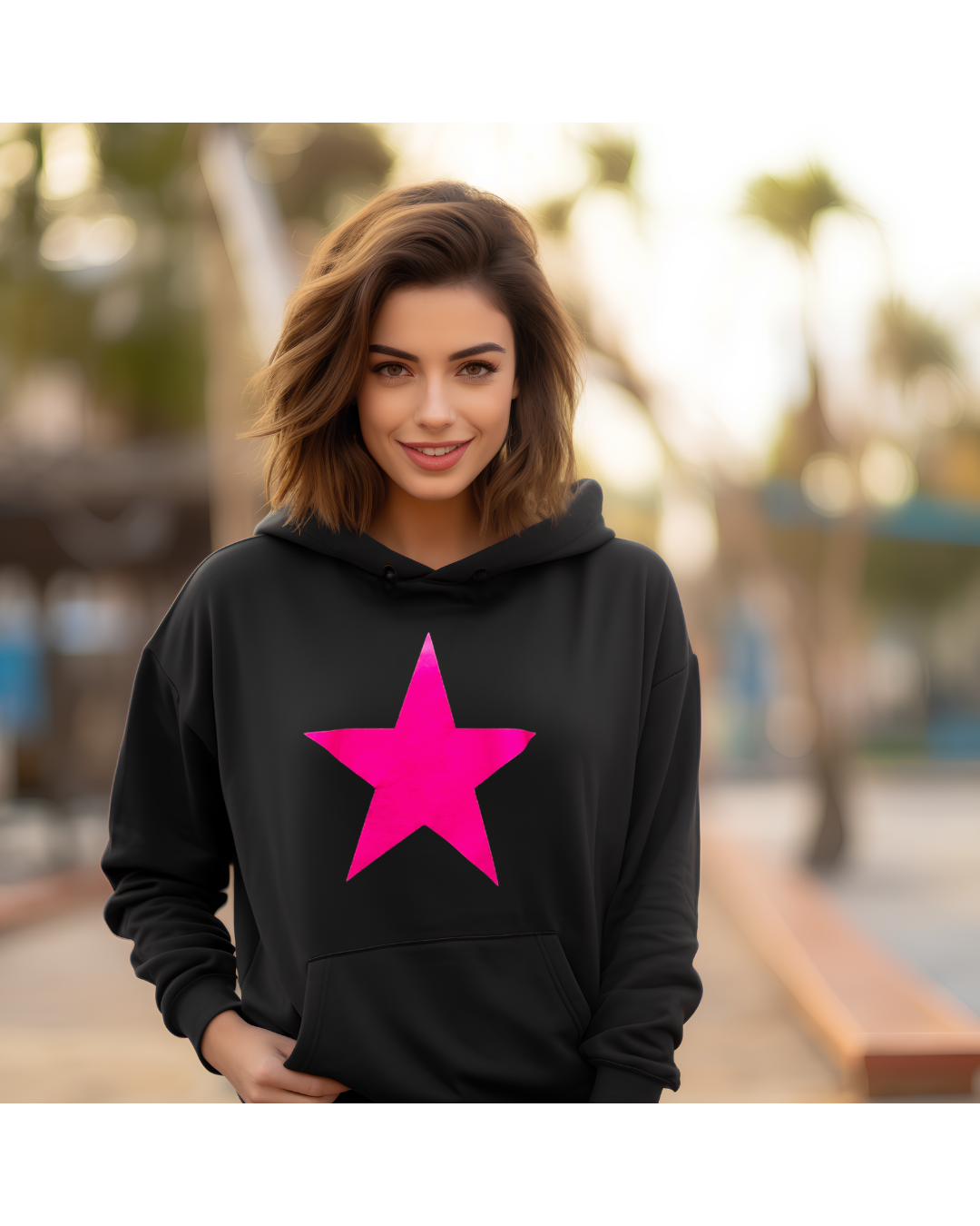 Neon Pink Star Hoodie – Black Pullover with Bold Graphic for Bright, Cozy Style