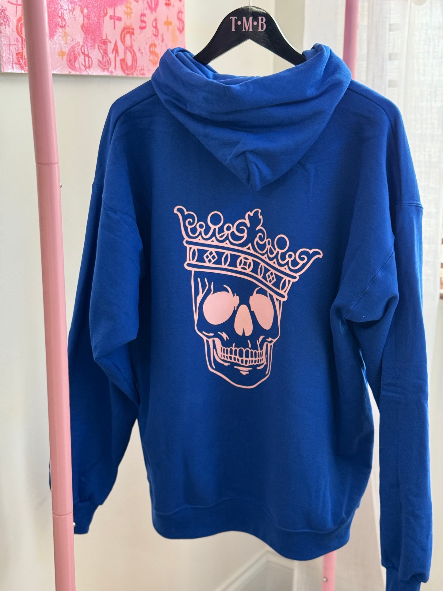 Reign Supreme Hoodie – Royal Blue with Pink Crowned Skull Graphic, Bold & Edgy Style