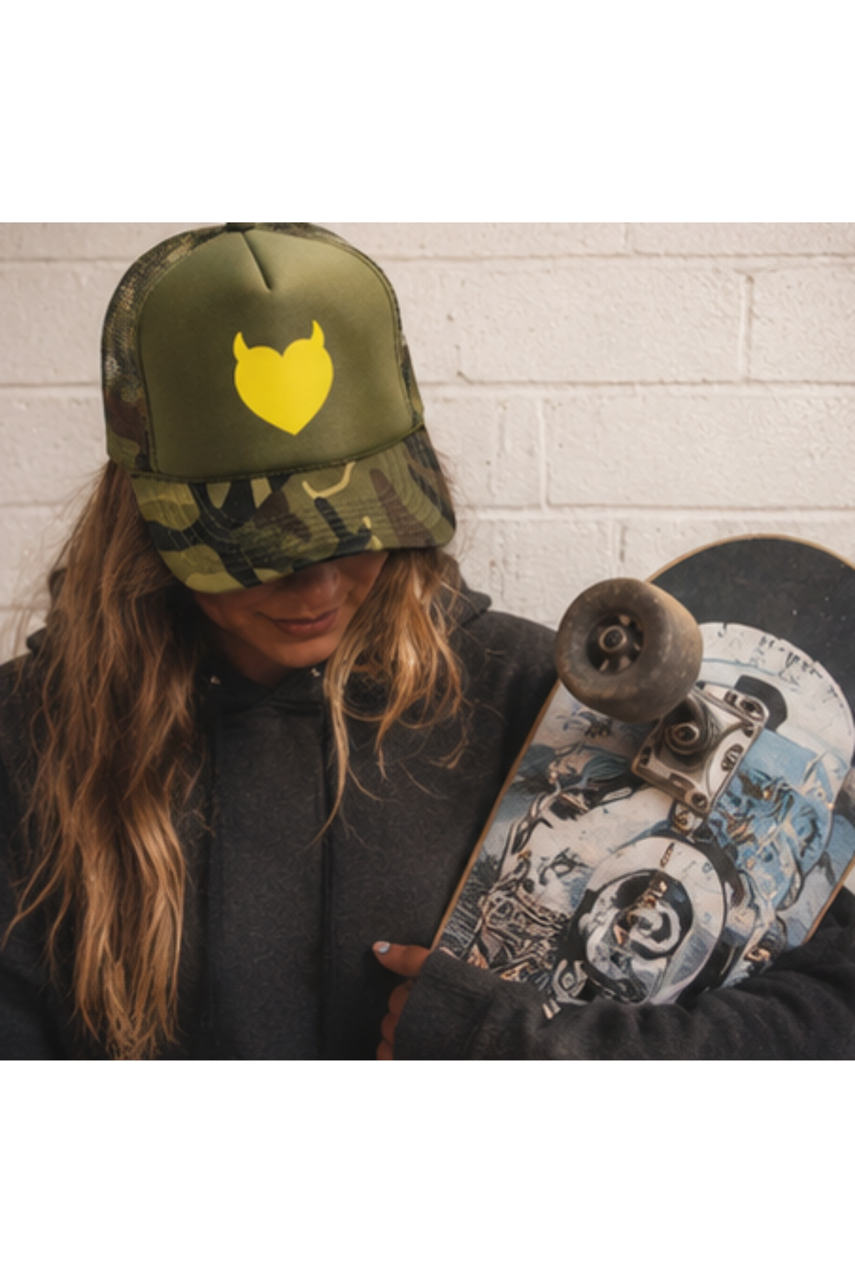 Devilish Trucker Hat – Camo & Green Structured Trucker Cap with Yellow Devil Heart