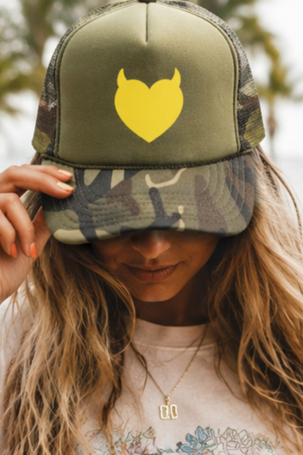 Devilish Trucker Hat – Camo & Green Structured Trucker Cap with Yellow Devil Heart