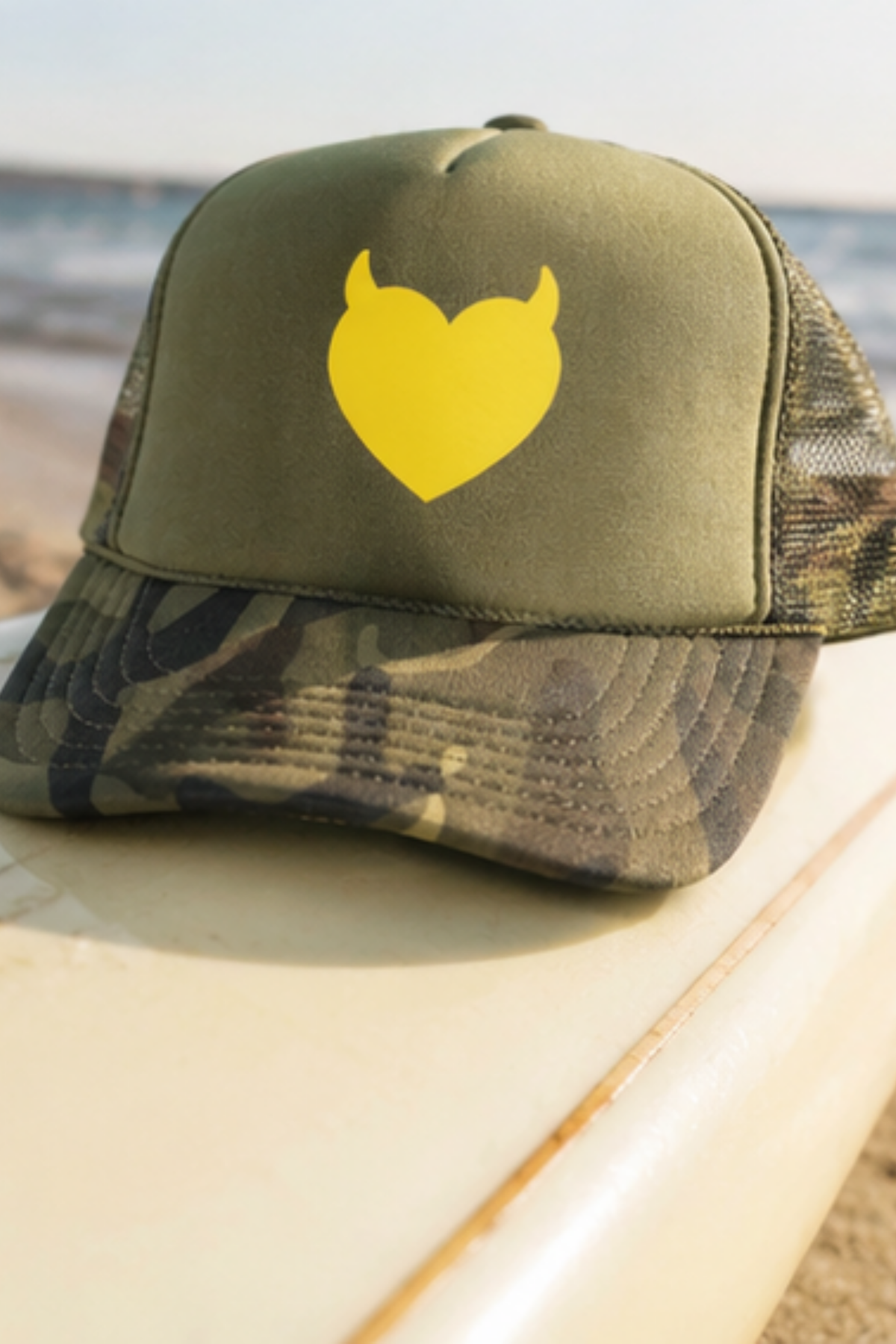 Devilish Trucker Hat – Camo & Green Structured Trucker Cap with Yellow Devil Heart