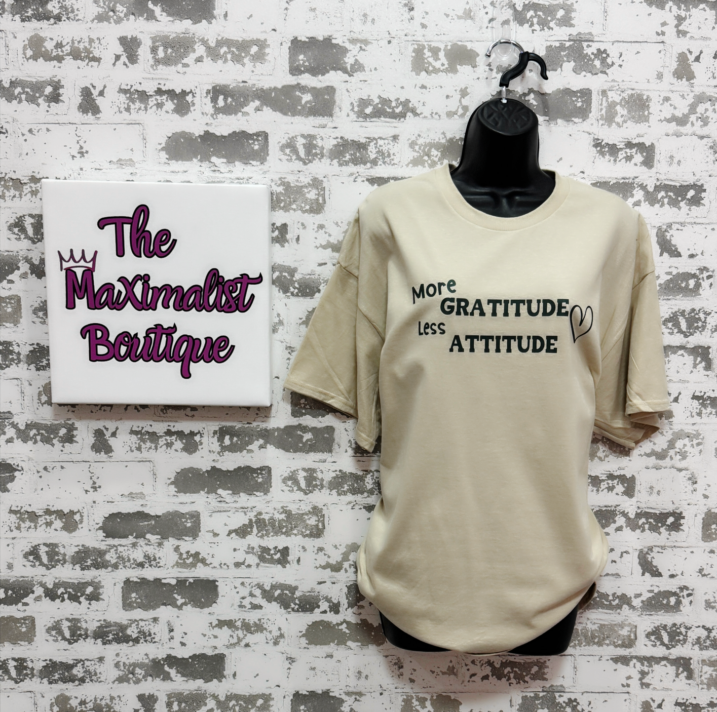 More Gratitude Less Attitude T-Shirt – Sand-Colored Tee with Green Positive Vibes Graphic