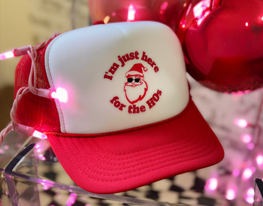 “I’m Just Here for the HOs” Trucker Hat – Bold Santa Cap for Playful Holiday Style