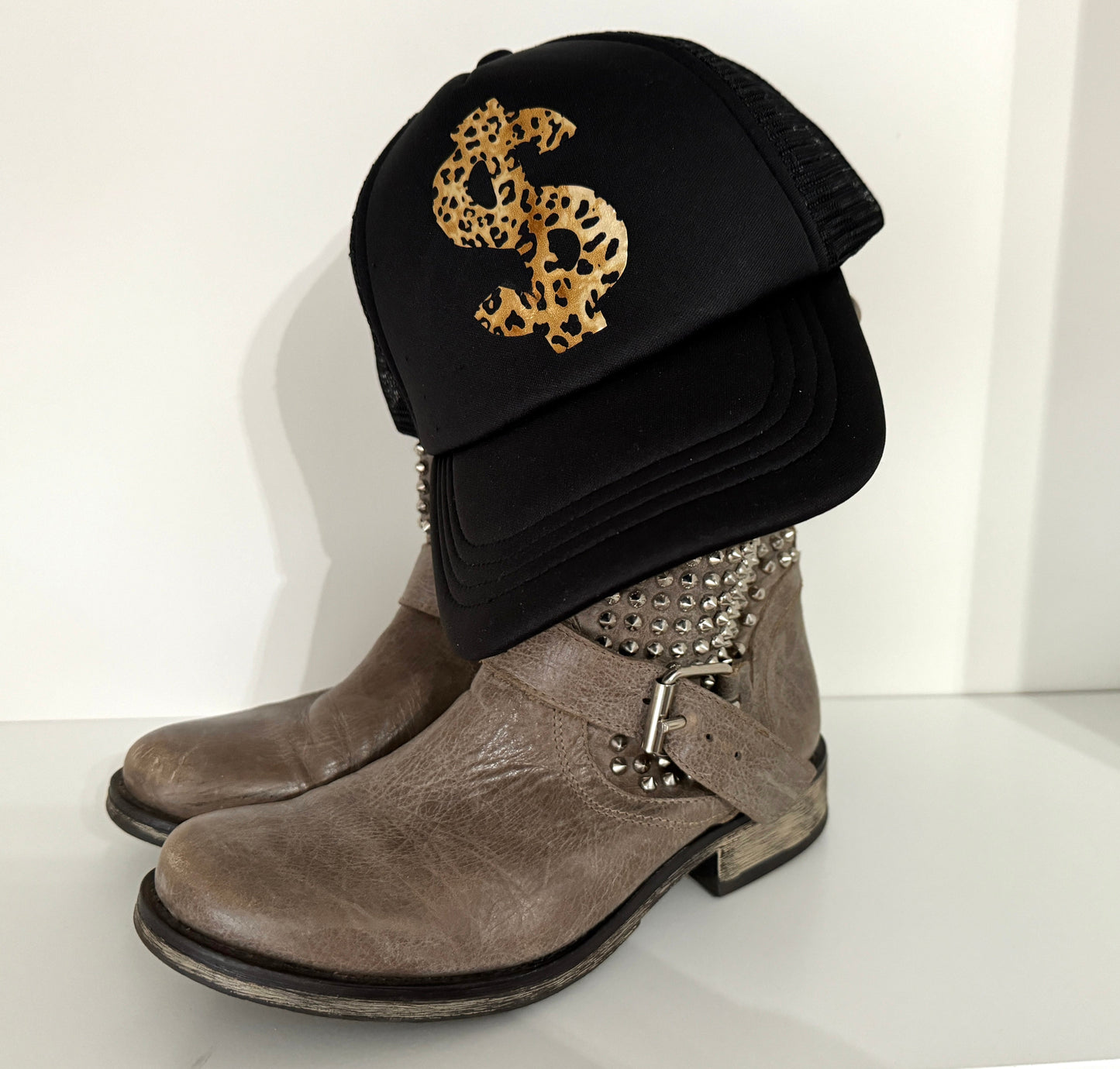 Black hat with leopard print dollar signBold & Fierce | Trucker Hat with Leopard Print Dollar Sign Graphic