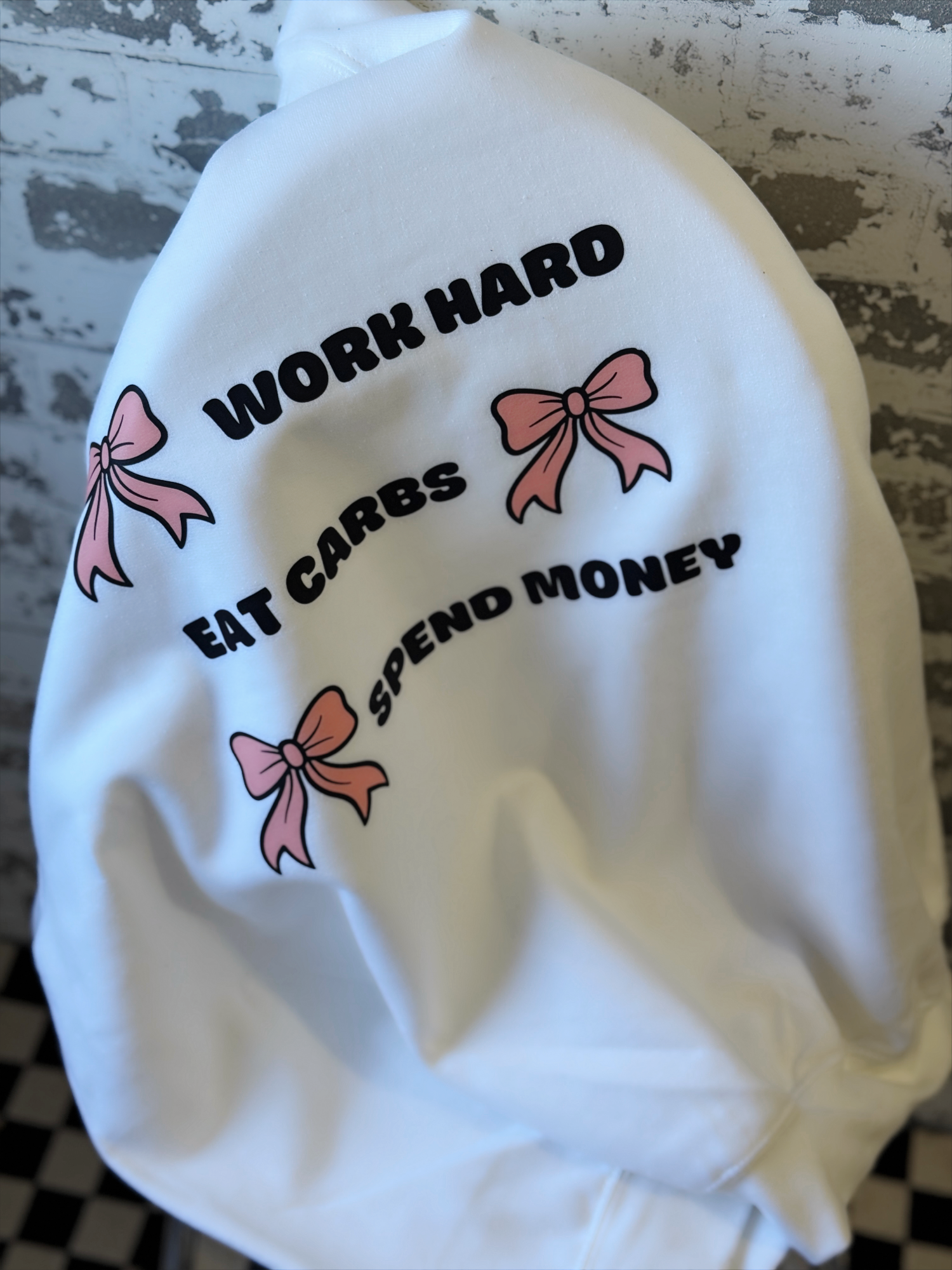 White sweatshirt with bows 