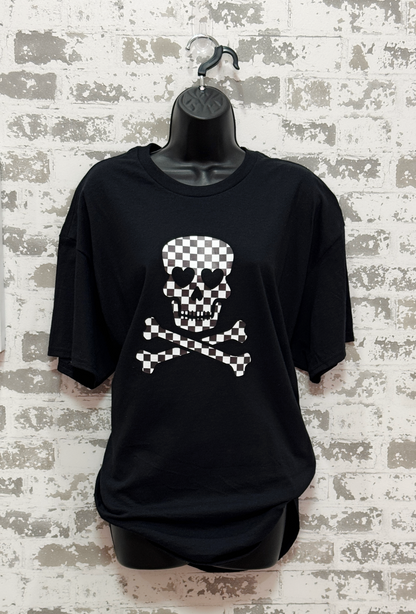 Black t-shirt with a skull and crossbones design on a textured wall background