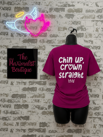 Berry t-shirt with text 'Chin Up, Crown Straight' on a brick wall background.