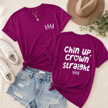 Berry t-shirt with a crown design and text, paired with denim shorts and white sneakers on a light background.