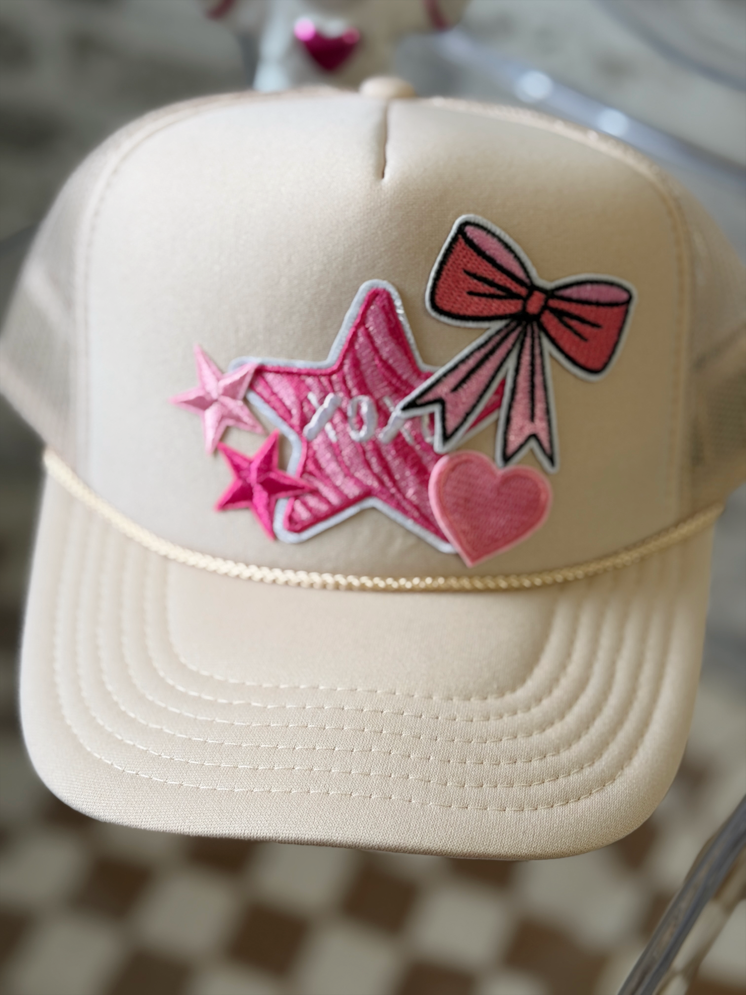 Cream XO Bow Trucker Hat