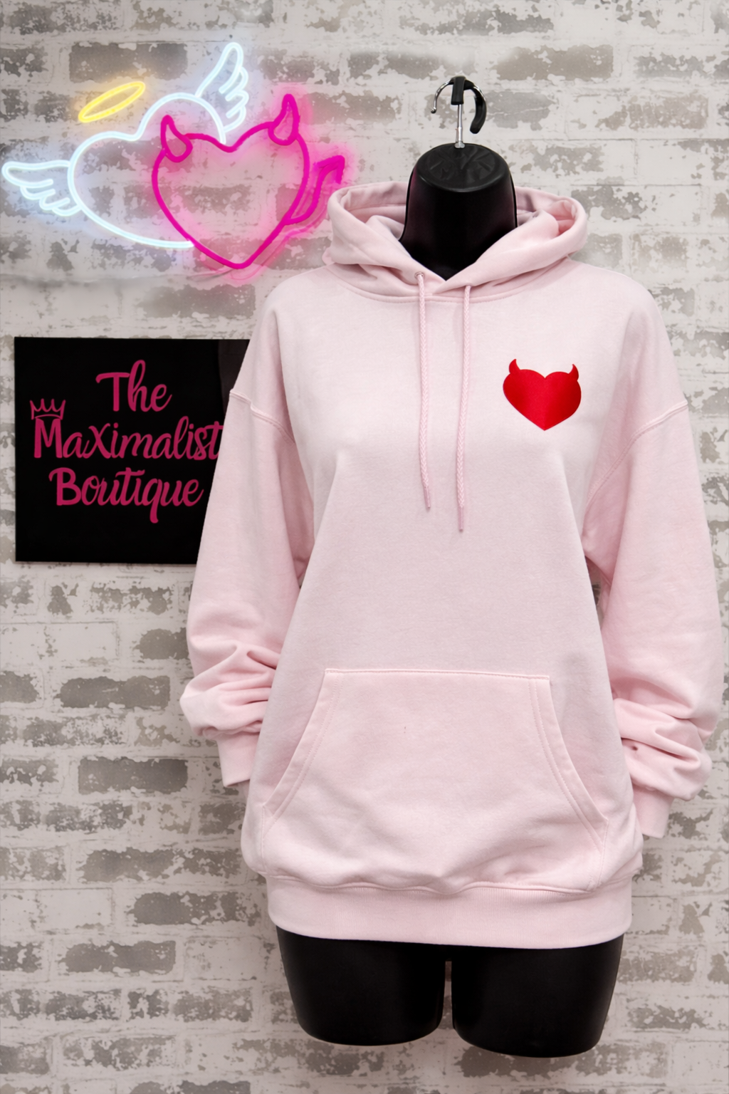 Devilish Hoodie – Light Pink Pullover with Red Heart & Bold Graphic Text