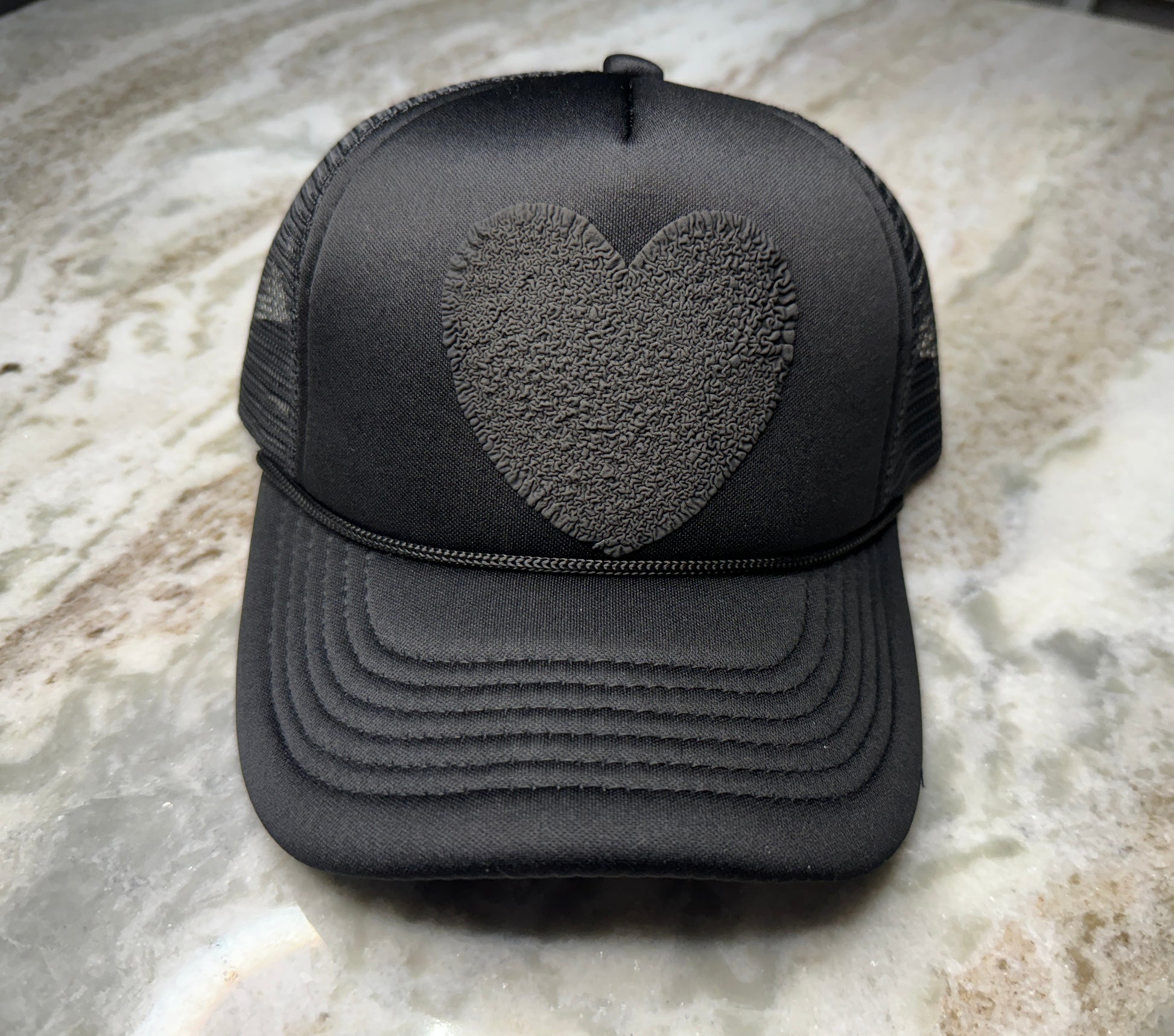 Effortlessly Cool | Black Trucker Hat with Puffy Heart Graphic