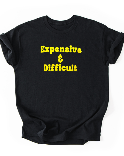 Black t-shirt with yellow text 'Expensive & Difficult' on a white background