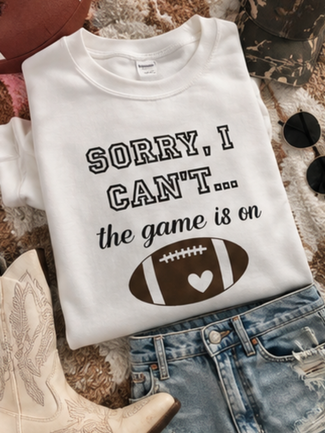  a sweatshirt with a football graphic and text