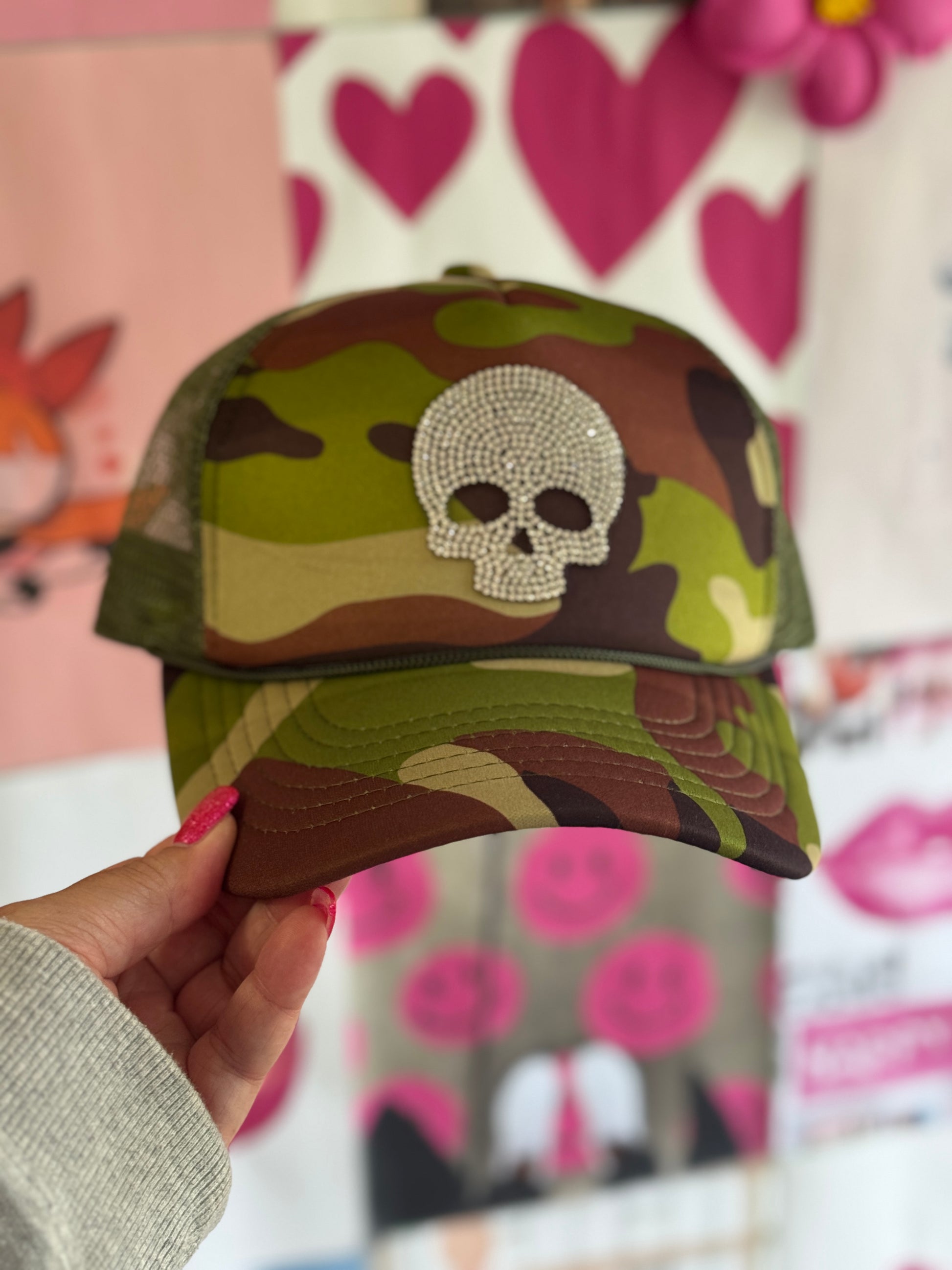 Glitz & Grit Trucker Hat – Camo with Rhinestone Skull Graphic, Bold & Sparkling