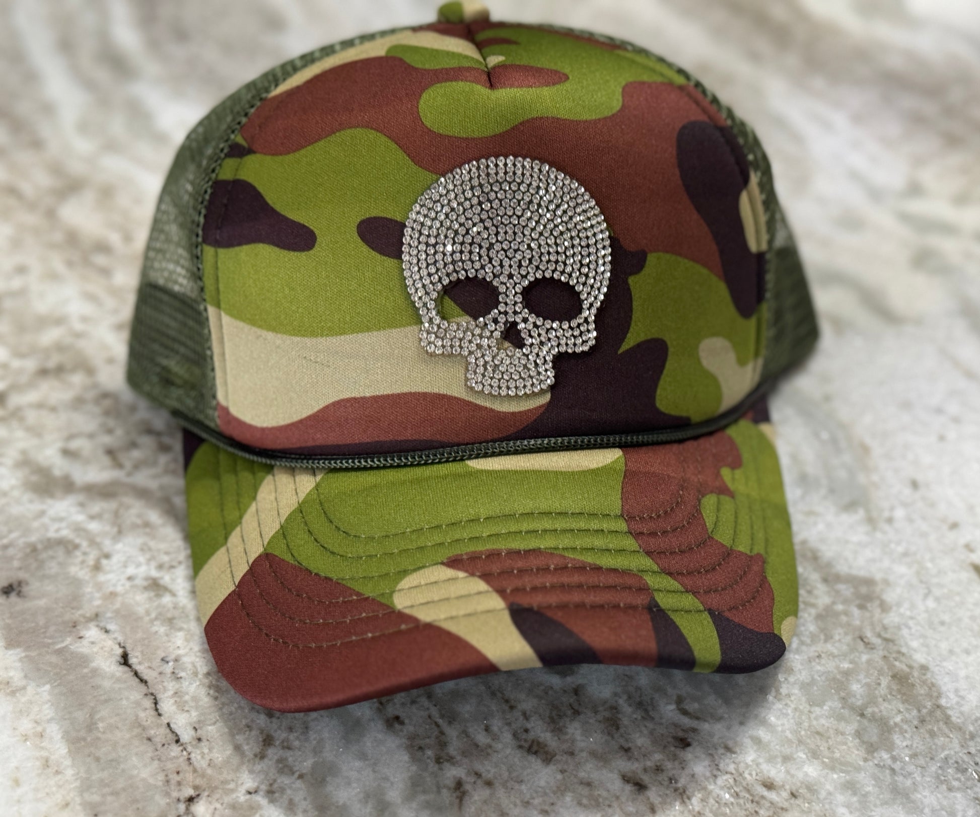 Glitz & Grit Trucker Hat – Camo with Rhinestone Skull Graphic, Bold & Sparkling