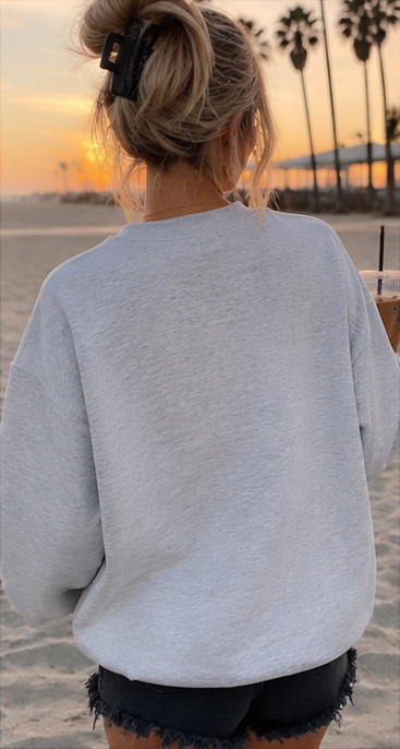 a light gray crewneck sweatshirt 