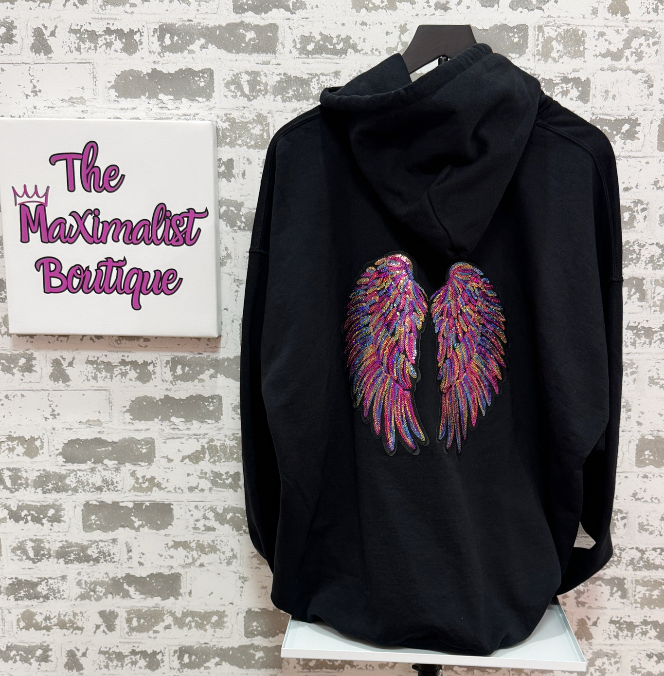 Celestial Glow Hoodie – Black Pullover with Multicolored Sequin Angel Wings Graphic
