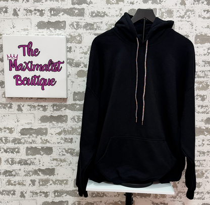 Celestial Glow Hoodie – Black Pullover with Multicolored Sequin Angel Wings Graphic