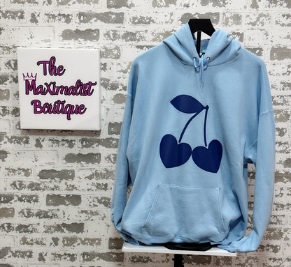 Sweetheart Cherries Hoodie – Light Blue Pullover with Heart-Shaped Cherry Graphic for Cute Cozy Style