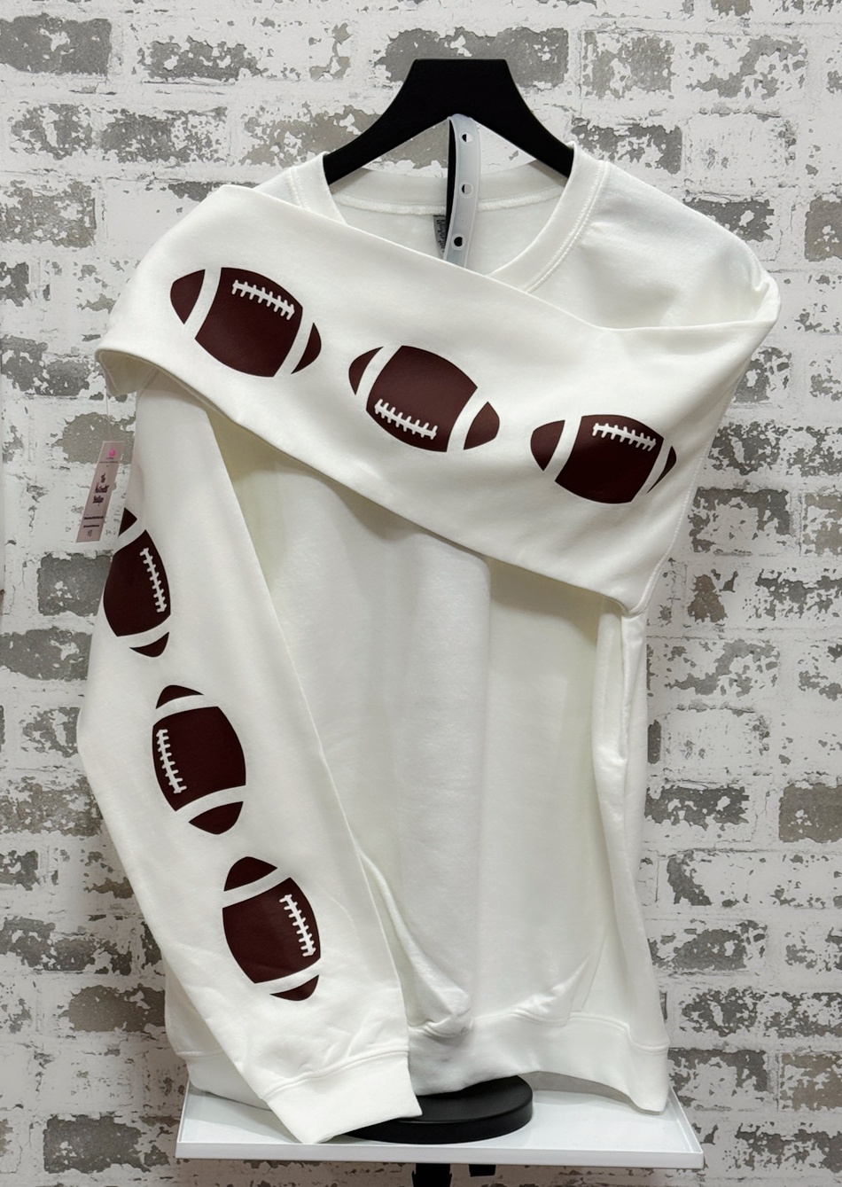 Throwing Spirals Sweatshirt – White Pullover with Football Sleeve Graphics for Game Day Style