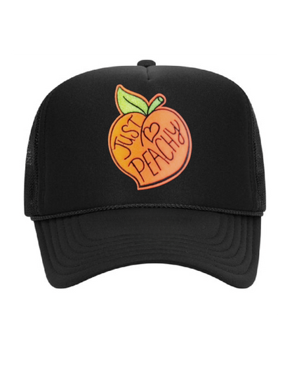 Black cap with peach graphic and 'Just Peachy' text on a white background