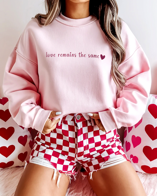 Light Pink Sweatshirt – Soft Pink Love Remains the Same Graphic, Cozy & Chic on model 