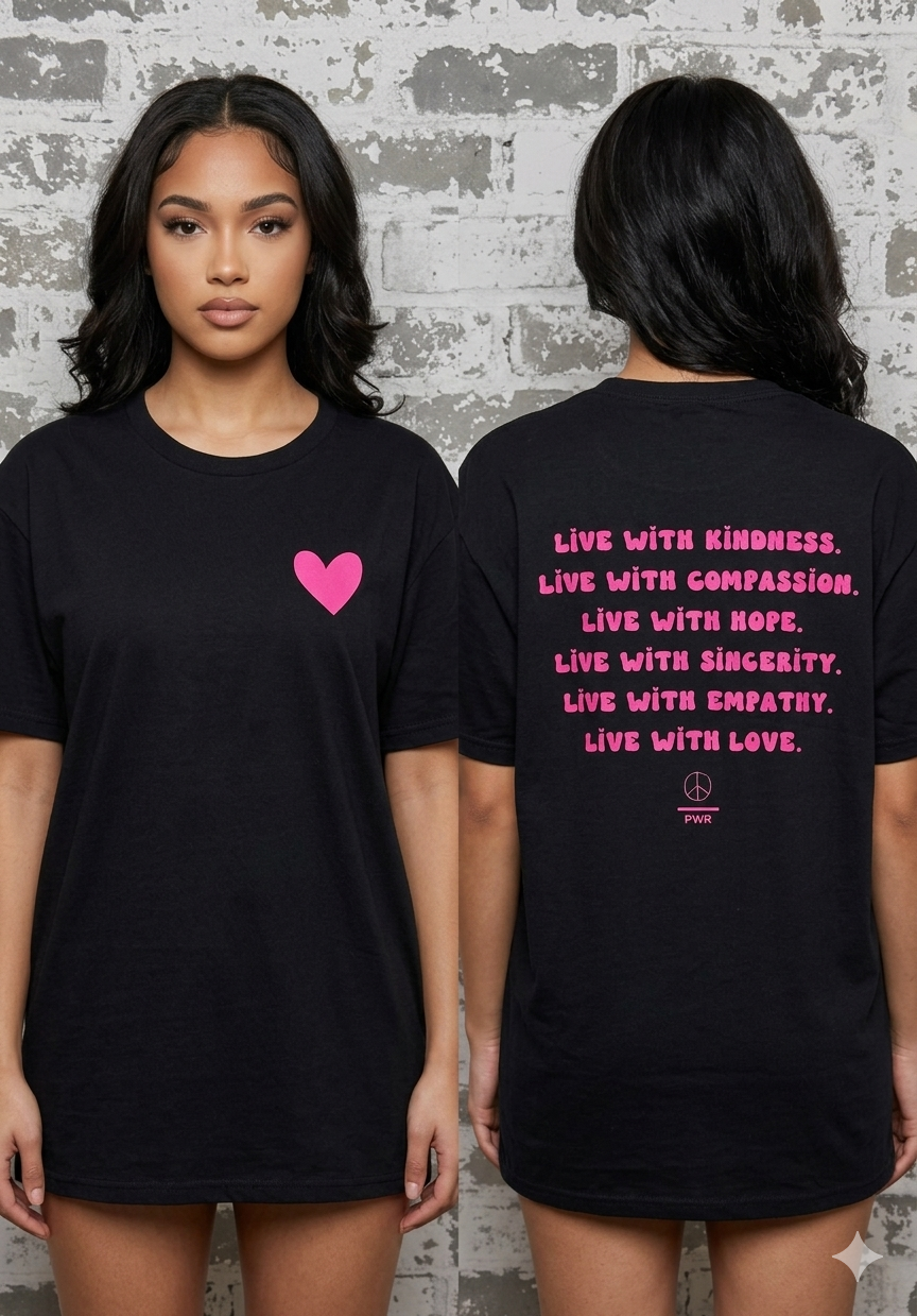 Black t-shirt with pink heart and motivational quote on a textured wall background