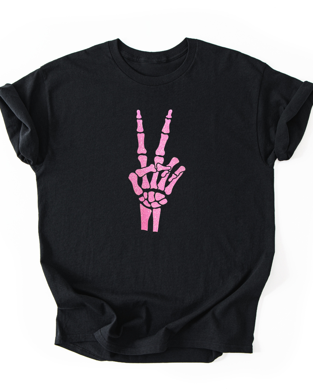Black t-shirt with pink skeleton hand design on a white background