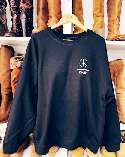 Power of Love | Black Sweatshirt with Light Pink Graphic & Peace Over Power Logo