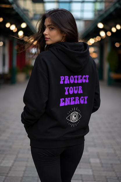 Model wearing a black hoodie with Protect Your energy graphic on back 