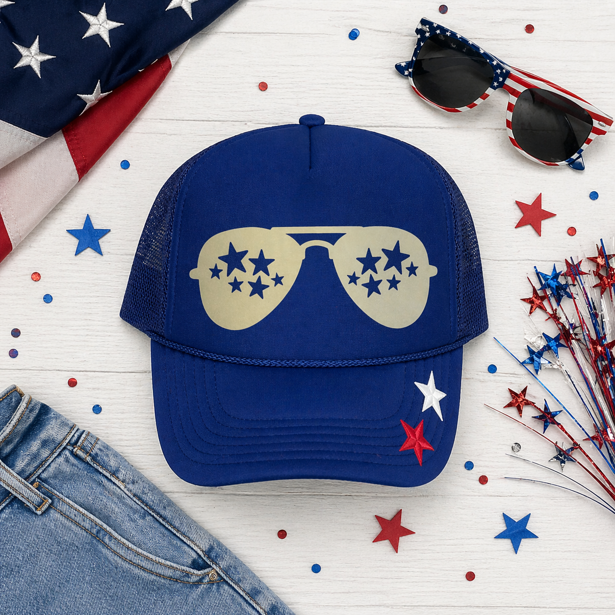 Blue cap with star sunglasses design on a white background with American flags and stars.