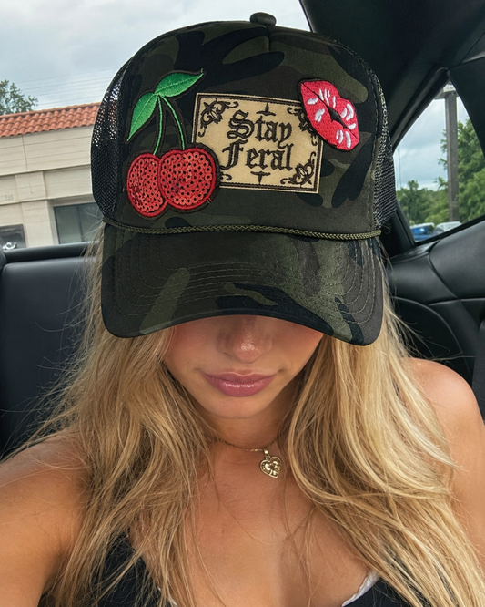 Stay Feral Camo Trucker Hat – Cherry & Lips Graphic Hat