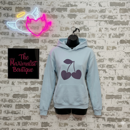 Sweetheart Cherries Hoodie – Light Blue Pullover with Heart-Shaped Cherry Graphic for Cute Cozy Style