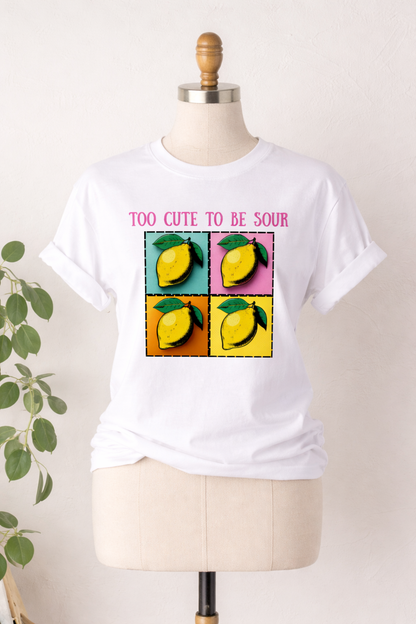 White t-shirt with lemon graphic and text on a mannequin against a white background