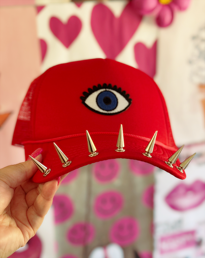 Watchful Edge Trucker Hat – Bold Red with Evil Eye Patch & Silver Spike Brim