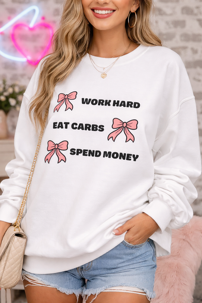 Carbs & Cash Bow Sweatshirt – White Pullover with Pink Bow & ‘Work Hard, Eat Carbs, Spend Money’ Graphic